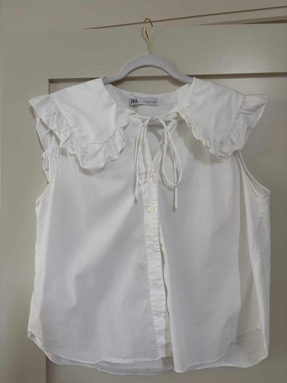 Zara Cream Ruffled Tie-Front Sleeveless Blouse